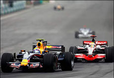 Webber overtakes Hamilton